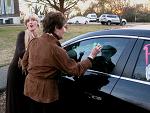 Decorating Jeannie and Gene's car at their reception with Cindy Moore